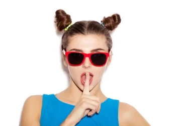 Depositphotos 69491289 stock photo beautiful brunette woman with finger